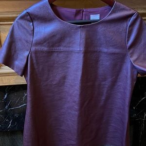 Faux leather tee style top.